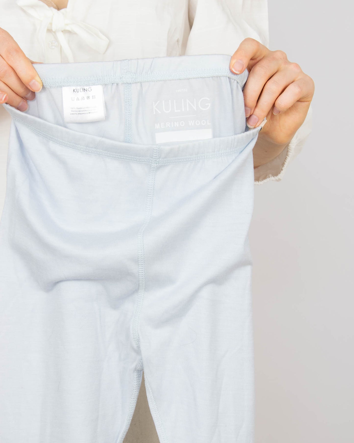 Błękitne wełniane (merino) legginsy dziecięce KULING - 146/152