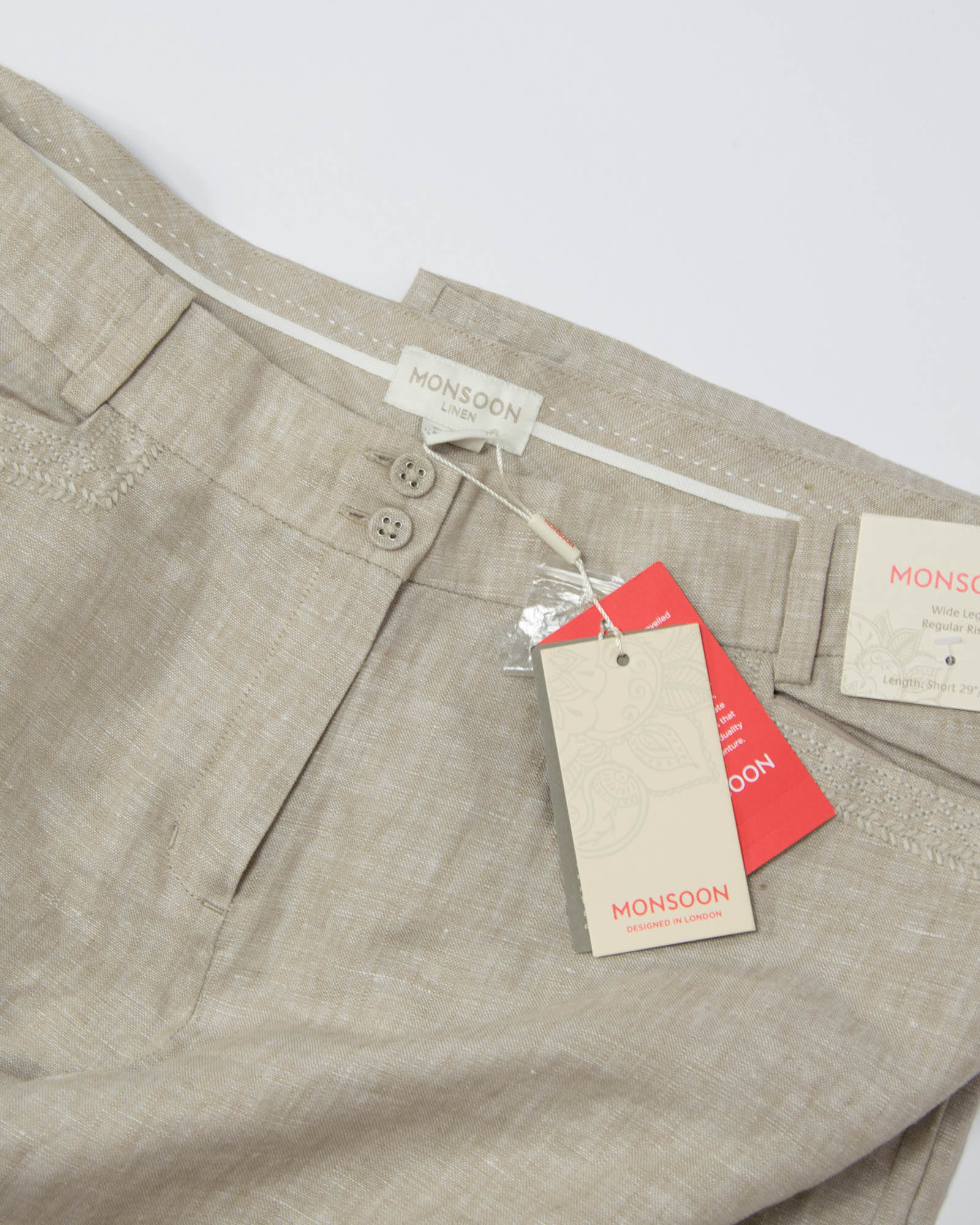 Nowe beżowe lniane spodnie z szeroką nogawką - L