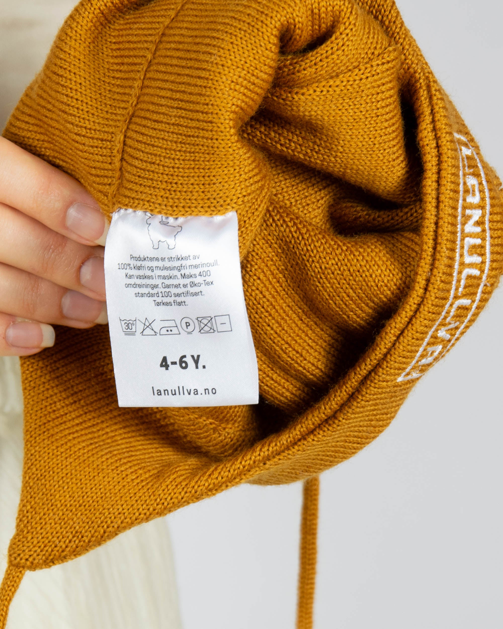 Pomarańczowo brązowa (merino) czapka dziecięca LANULLVA  4-6 lat