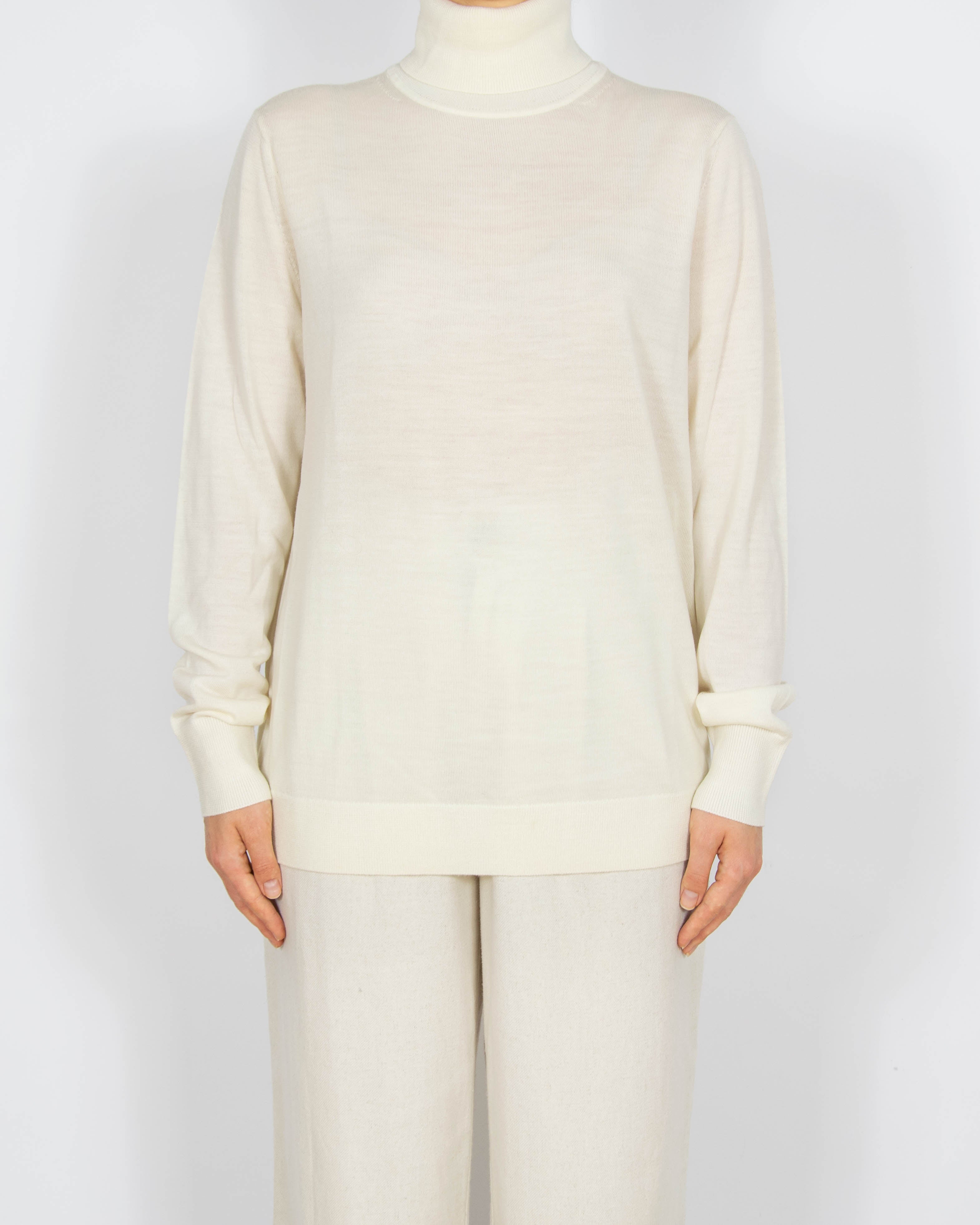 Kremowy wełniany (merino) sweter z golfem Uniqlo