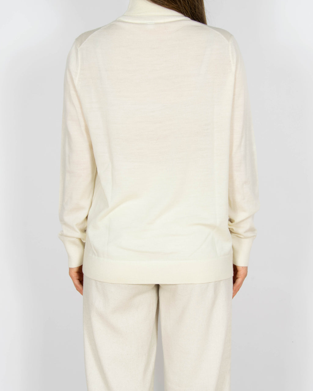 Kremowy wełniany (merino) sweter z golfem Uniqlo - L