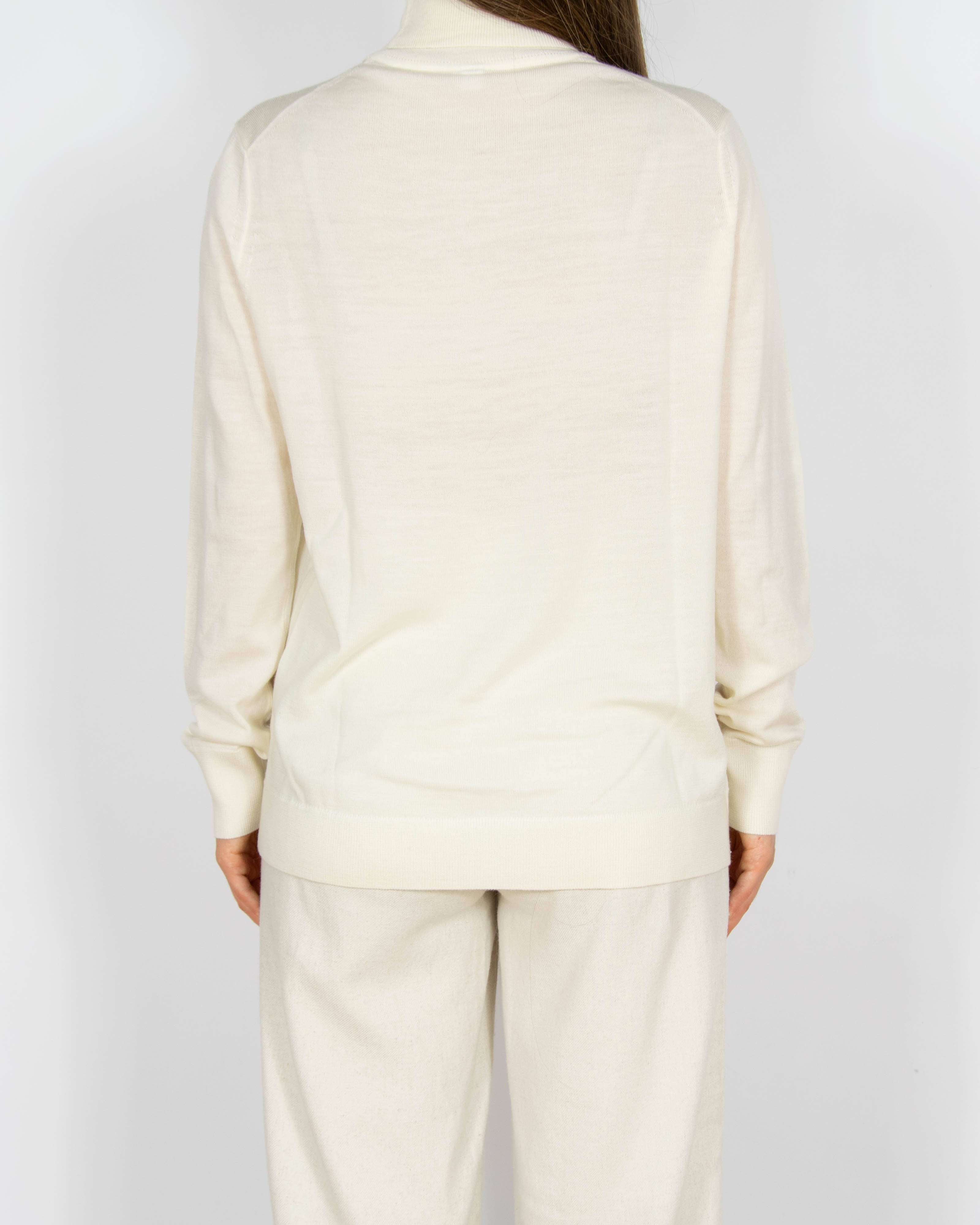 Kremowy wełniany (merino) sweter z golfem Uniqlo - L