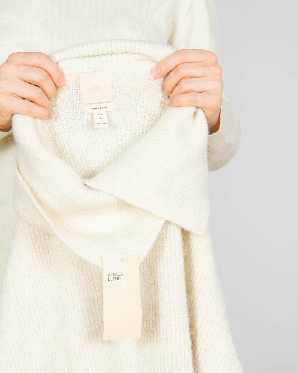 Nowy kremowy wełniany (wełna + alpaka) sweter H&M Premium - L