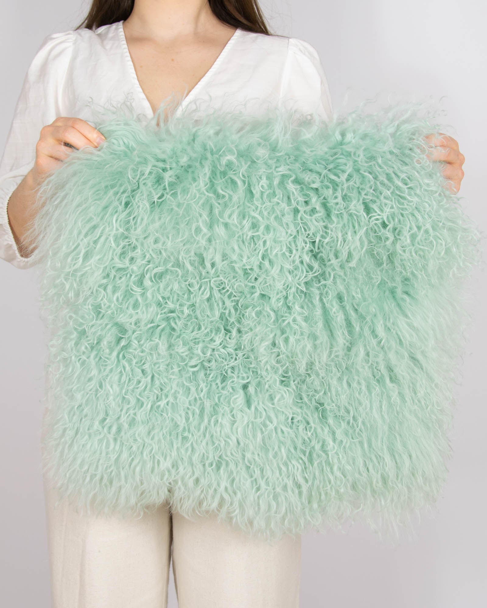 Miętowa wełniana poszewka na poduszkę