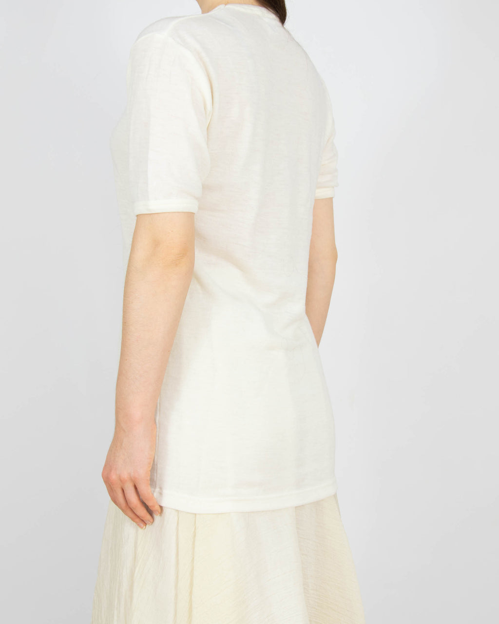 Śmietankowa wełniana (pure new wool) podkoszulka - M