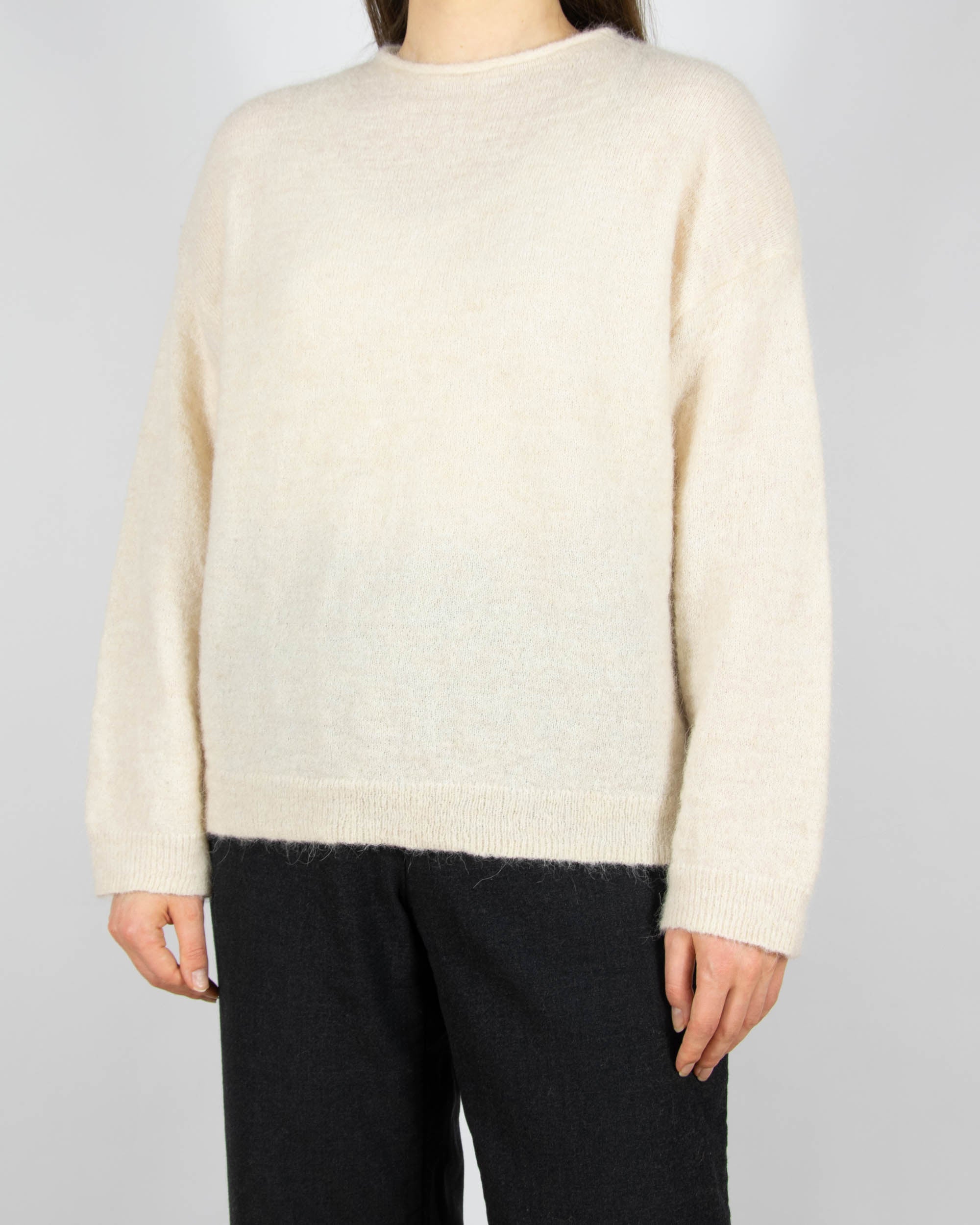 Kremowy (alpaka + wełna) sweter marki Cubus.